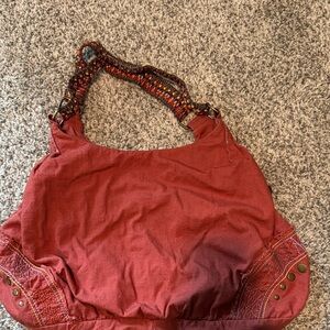 Decree Rust Red Shoulder Bag with Woven Multicolor Strap